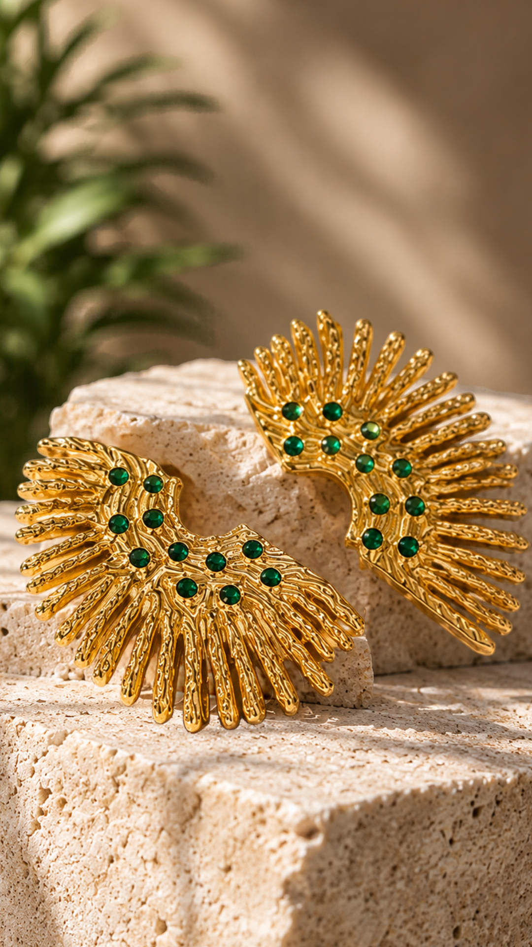 Medoso Vimosa Studs placed on a limestone, highlighting the earrings’ sculptural silhouette.